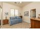 Well-lit bedroom showcases a daybed and a window view for a relaxing and comfortable atmosphere at 8698 E Preserve Way, Scottsdale, AZ 85266