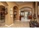 Welcoming hallway with neutral colors and elegant archways at 8698 E Preserve Way, Scottsdale, AZ 85266