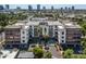 Aerial shot of apartment complex with inviting pool and palm tree landscaping at 914 E Osborn Rd # 404, Phoenix, AZ 85014