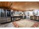 Stylish bar area with stainless steel appliances, custom cabinetry, and unique decor at 914 E Osborn Rd # 404, Phoenix, AZ 85014