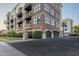 Beautiful building exterior with garage access, landscaping and convenient parking at 914 E Osborn Rd # 404, Phoenix, AZ 85014