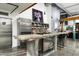 This modern kitchen is equipped with stainless steel appliances and a large center island at 914 E Osborn Rd # 404, Phoenix, AZ 85014
