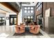 Inviting living room featuring a cozy seating arrangement, fireplace, and natural light at 914 E Osborn Rd # 404, Phoenix, AZ 85014