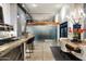 View from kitchen to dining/living, open floorplan with natural light & modern design at 914 E Osborn Rd # 404, Phoenix, AZ 85014