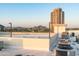 Building rooftop overlooking city, mountain views, and air conditioning units at 914 E Osborn Rd # 404, Phoenix, AZ 85014