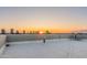 Rooftop view of city skyline during sunset with safety railings at 914 E Osborn Rd # 404, Phoenix, AZ 85014