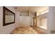 Spacious living room featuring neutral tones, tile floors, and recessed lighting at 9505 E Jenan Dr, Scottsdale, AZ 85260