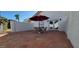Private patio is perfect for enjoying outdoor living with a dining table and chairs at 9505 E Jenan Dr, Scottsdale, AZ 85260