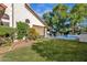 Lush backyard with pool, mature trees and landscaping offers a tranquil setting for relaxation and outdoor enjoyment at 9821 E Windrose Dr, Scottsdale, AZ 85260