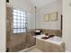 Clean bathroom with a shower and a soaking tub, creating a spa-like experience at 9821 E Windrose Dr, Scottsdale, AZ 85260