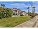 Charming single-Gathering home with well-kept landscaping, a tile roof, and a multi-car garage in a desirable location at 9821 E Windrose Dr, Scottsdale, AZ 85260