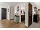 Bright hallway leading to the bathroom and bedroom at 9821 E Windrose Dr, Scottsdale, AZ 85260