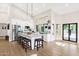 Beautiful kitchen with stainless steel appliances, large island with seating, and modern design at 9821 E Windrose Dr, Scottsdale, AZ 85260