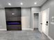 Sleek living room features an electric fireplace, ample space, and a closet at 10637 N 16Th Ave, Phoenix, AZ 85029