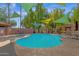 Spacious community pool and hot tub area with sunshades, ideal for relaxation and recreation at 1075 E Chandler Blvd # 212, Chandler, AZ 85225