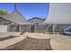 Backyard featuring gravel, brick wall, and sunshade sails at 1107 E La Salle St, Phoenix, AZ 85040
