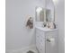 Bathroom showcases vanity with storage, decorative mirror and ample counter space at 1107 E La Salle St, Phoenix, AZ 85040