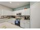 Bright kitchen with stainless appliances, stone floors, and lots of storage at 1107 E La Salle St, Phoenix, AZ 85040
