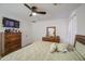 A comfortable main bedroom featuring ceiling fan and lots of natural light at 1107 E La Salle St, Phoenix, AZ 85040