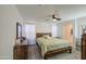 A comfortable main bedroom with ceiling fan and lots of natural light at 1107 E La Salle St, Phoenix, AZ 85040
