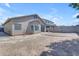 Wide backyard with partial block fencing, showcasing ample space for customization and outdoor activities at 11630 W Jefferson St, Avondale, AZ 85323