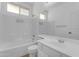 Bright bathroom featuring single sink, and a shower over tub at 11630 W Jefferson St, Avondale, AZ 85323