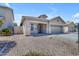 Well-maintained single-story home featuring desert landscaping, a two-car garage, and neutral stucco at 11630 W Jefferson St, Avondale, AZ 85323