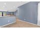 Kitchen area opens to other rooms and features light-brown tile flooring at 11630 W Jefferson St, Avondale, AZ 85323