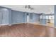 Open concept living area featuring hard wood floors and ample natural light at 11630 W Jefferson St, Avondale, AZ 85323