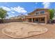 Spacious backyard with a covered patio, offering an ideal space for outdoor living and entertaining at 13617 W Crocus Dr, Surprise, AZ 85379