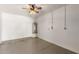 Spacious garage with painted floors, water heater, and ample room for vehicles and storage at 13617 W Crocus Dr, Surprise, AZ 85379