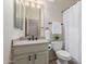 Bathroom featuring granite countertops, vanity, and toilet at 14657 N 103Rd Way, Scottsdale, AZ 85255