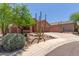 Desert home featuring a two-car garage and xeriscaped front yard at 14657 N 103Rd Way, Scottsdale, AZ 85255
