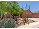 Desert home featuring a two-car garage and xeriscaped front yard at 14657 N 103Rd Way, Scottsdale, AZ 85255