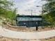 Community pickleball courts with viewing area, desert landscaping, and paved walkway at 14657 N 103Rd Way, Scottsdale, AZ 85255
