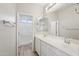 Bathroom featuring double sinks, a vanity, and a separate shower at 14870 W Encanto Blvd # 1091, Goodyear, AZ 85395