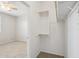 A partially outfitted closet space adjacent to the main bedroom at 14870 W Encanto Blvd # 1091, Goodyear, AZ 85395