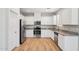 Modern kitchen features stainless steel appliances and granite countertops at 14870 W Encanto Blvd # 1091, Goodyear, AZ 85395