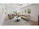 Bright open-concept living area showcasing stylish furniture and decor at 14870 W Encanto Blvd # 1091, Goodyear, AZ 85395