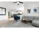 Bright and open living space featuring a stylish kitchen and comfortable seating arrangement at 1492 W Bruce Ave, Gilbert, AZ 85233