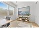 Bright home office with modern decor, large windows, a neutral rug, and a desk for working from home at 1492 W Bruce Ave, Gilbert, AZ 85233