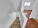 View of the staircase leading to the front door and upper level rooms at 1750 E Mateo Cir # 103, Mesa, AZ 85204