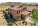 A lovely two-story home, in a quiet suburb, with red tiled roof and owned solar panels on the roof at 18132 W Cardinal Dr, Goodyear, AZ 85338