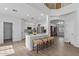 Open kitchen with breakfast bar, stainless appliances and seamless access to a spacious living area at 18132 W Cardinal Dr, Goodyear, AZ 85338