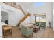 Bright living area offers seamless access to a covered outdoor patio at 18132 W Cardinal Dr, Goodyear, AZ 85338