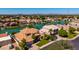 Panoramic aerial view of a lakefront community with beautiful homes, lush landscaping, and serene waters at 1834 E Willow Tree Ct, Gilbert, AZ 85234