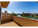 Balcony view of the neighborhood lake, blue skies, landscaping, and surrounding homes at 1834 E Willow Tree Ct, Gilbert, AZ 85234