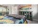 Cozy bedroom featuring a colorful quilt, bedside table, and dresser at 1834 E Willow Tree Ct, Gilbert, AZ 85234