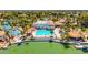 Aerial view of community center with pool, tennis courts, and lake access at 1834 E Willow Tree Ct, Gilbert, AZ 85234