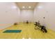Workout room with ping pong table, exercise bike, and stretching area at 1834 E Willow Tree Ct, Gilbert, AZ 85234
